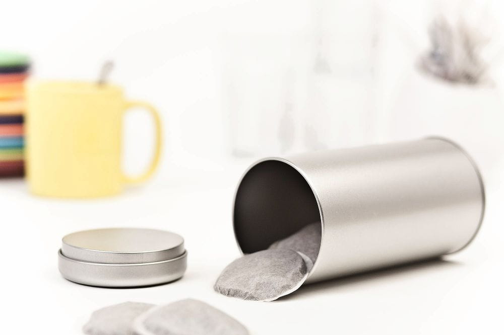 round tea tin box
